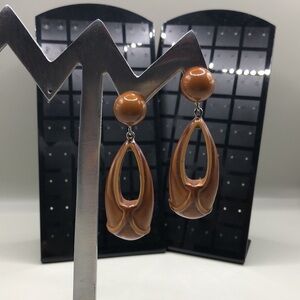 Brown carved bakelite look vintage statement long dangle drop earrings.